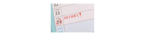 Calendar with friends 24 circled in red with big letters next to it saying PAYDAY! in capital letters